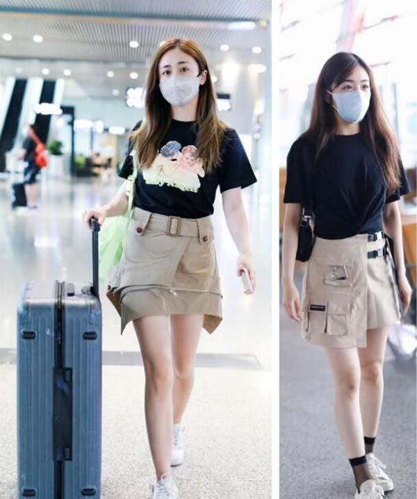 Áo phông đen + quần short màu kem