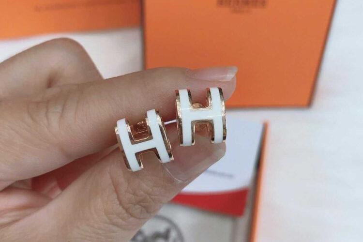 Set vòng tay dây chuyền hoa tai Hermes trắng hồng vàng
