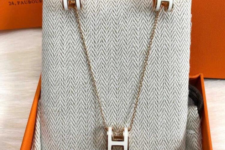Set vòng tay dây chuyền hoa tai Hermes trắng hồng vàng