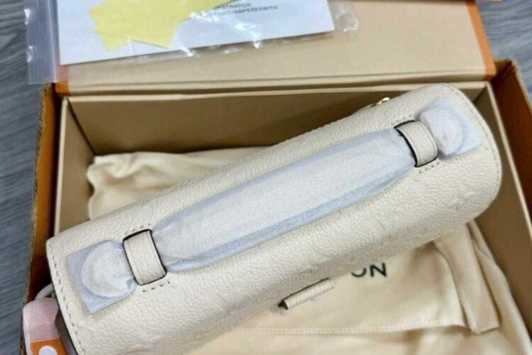 Túi LV Pochette Métis East West M22942 Creme Monogram Empreinte Kem