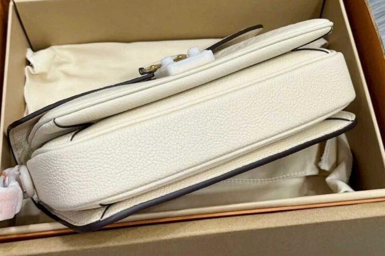 Túi LV Pochette Métis East West M22942 Creme Monogram Empreinte Kem