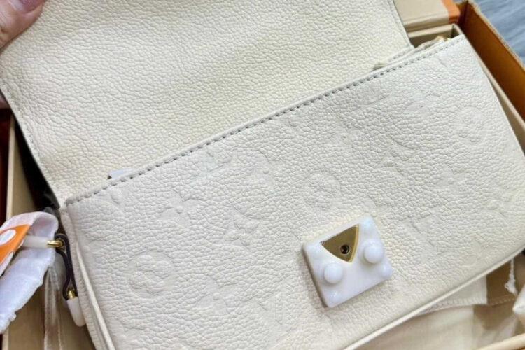 Túi LV Pochette Métis East West M22942 Creme Monogram Empreinte Kem