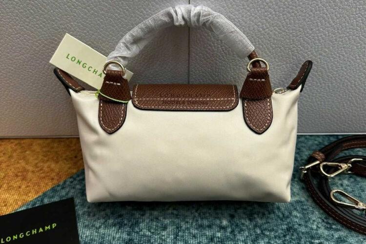 Túi Longchamp Le Pliage Xtra XS Pouch Ecru Canvas Cognac Leather Kem