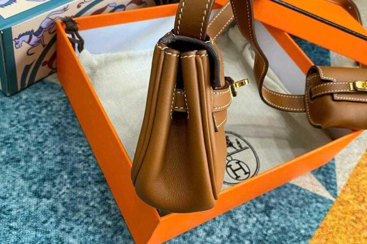TÚI HERMES KELLY MOOVE NOIR GOLD BROWN SWIFT NÂU KHÓA VÀNG
