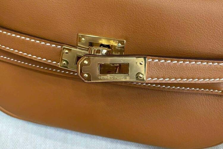 TÚI HERMES KELLY MOOVE NOIR GOLD BROWN SWIFT NÂU KHÓA VÀNG