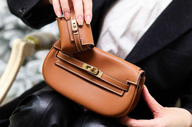 Túi Hermes Kelly Moove Noir Gold Brown Swift