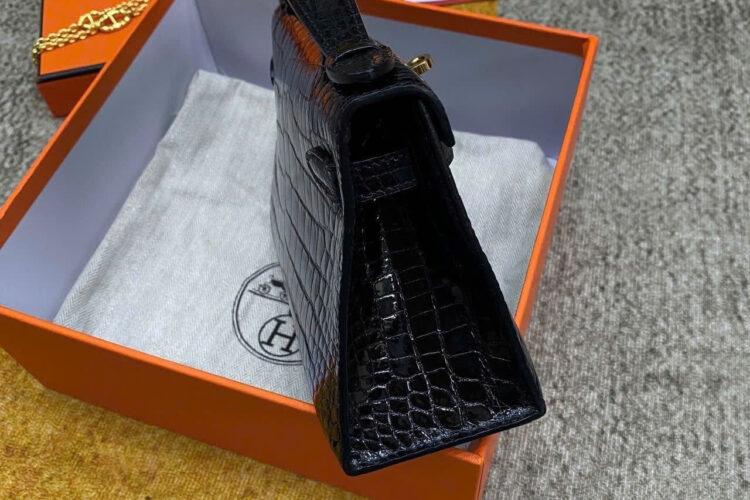Túi Hermes Kelly Pochette 22 Noir Shiny Alligator GHW May Tay