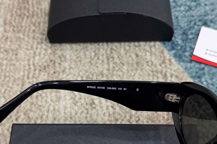 Mắt Kính Prada Oval Sunglasses Black