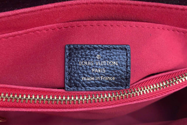 Hình ảnh thực tế túi xách LV Madeleine BB M45978 Bicolor Monogram Empreinte Đen Kem Best Quality tại Ruby Store