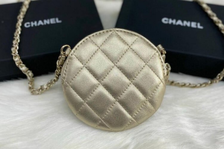 Túi CN Camellia Round Clutch With Chain Gold Lambskin
